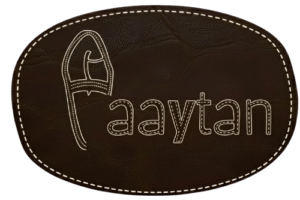 Paaytan logo featuring a handcrafted Kolhapuri chappal shaped ‘P’ with leather-texture background and stitched outline, representing premium traditional handmade footwear from Kolhapur.